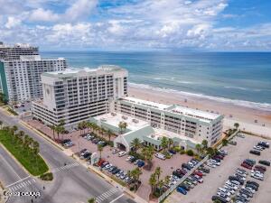 bird's eye view featuring a beach view and a water view