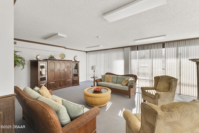 living room featuring a textured ceiling, crown molding, and light carpet