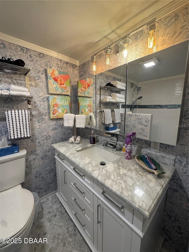 1233 S Atlantic Ave Unit 3070, Daytona Beach, FL 32118 - bathroom with toilet, vanity, crown molding, a tile shower, and tile patterned flooring