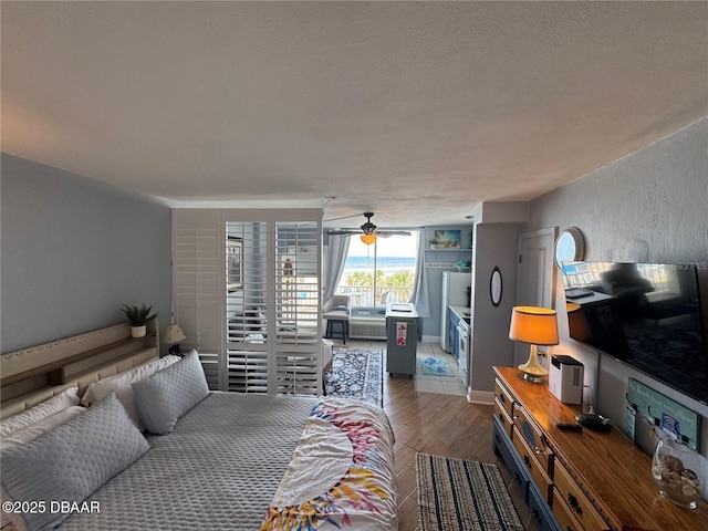 1233 S Atlantic Ave Unit 3070, Daytona Beach, FL 32118 - living room featuring wood finished floors and ceiling fan