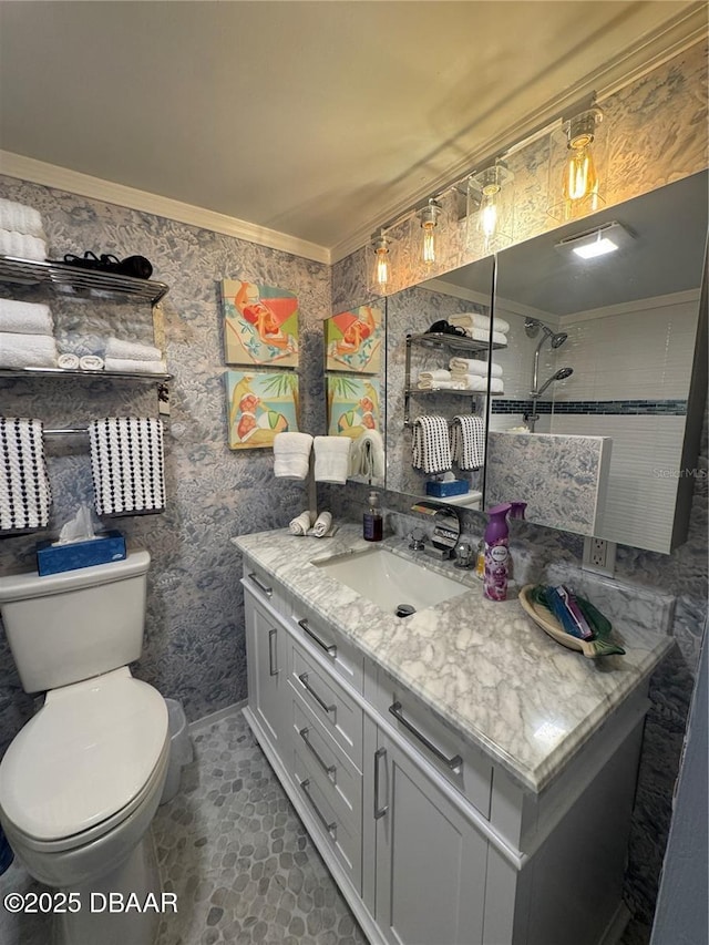 1233 S Atlantic Ave Unit 3070, Daytona Beach, FL 32118 - bathroom featuring vanity, toilet, and ornamental molding