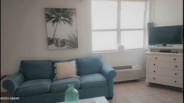 701 S Atlantic Ave Unit 615, Daytona Beach, FL 32118 - living area with a wall mounted AC and light tile patterned flooring