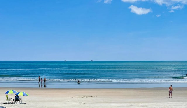 property view of water with a beach view