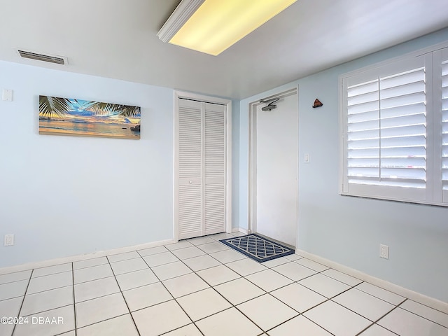 view of tiled empty room