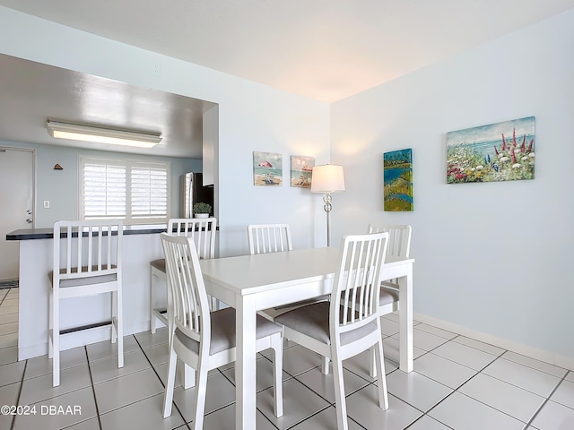 view of tiled dining area