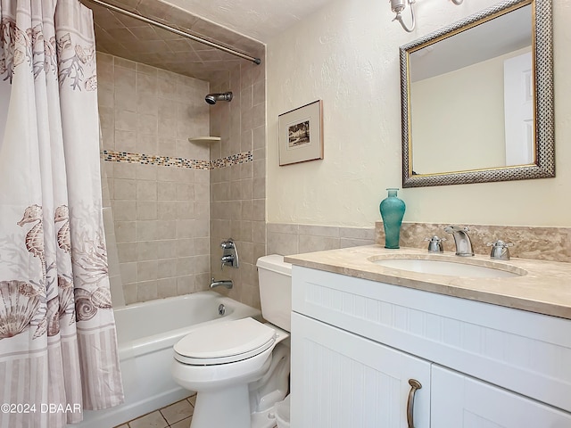 full bathroom with tile patterned flooring, vanity, toilet, and shower / bath combination with curtain