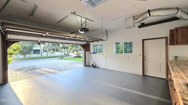 3128 John Anderson Dr, Ormond Beach, FL 32176 - garage featuring a garage door opener