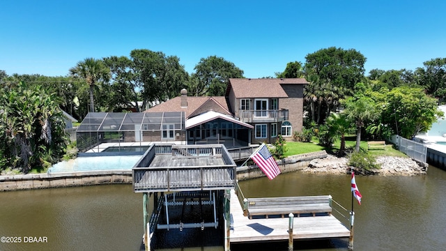 3128 John Anderson Dr, Ormond Beach, FL 32176 - dock featuring a water view, an outdoor pool, and a balcony