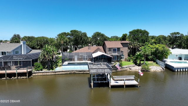 3128 John Anderson Dr, Ormond Beach, FL 32176 - dock area with an outdoor pool, a water view, glass enclosure, boat lift, and view of wooded area