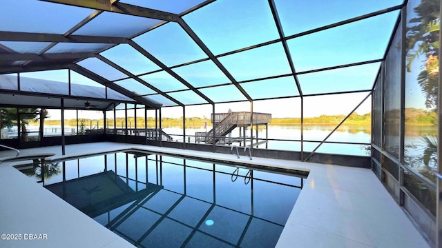 3128 John Anderson Dr, Ormond Beach, FL 32176 - outdoor pool featuring a water view, a lanai, a patio area, and stairway