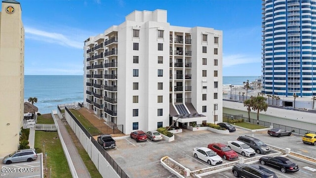 view of building exterior with a water view