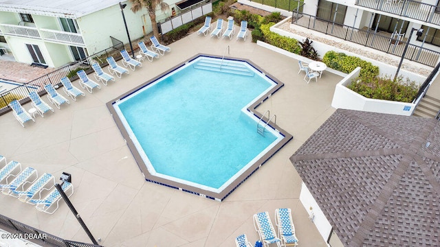 view of pool featuring a patio