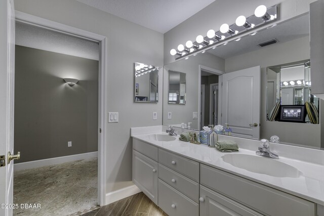 7 Foxfords Chase, Ormond Beach, FL 32174 - full bathroom featuring double vanity and baseboards