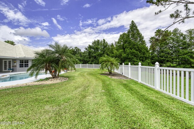 7 Foxfords Chase, Ormond Beach, FL 32174 - fenced backyard with french doors