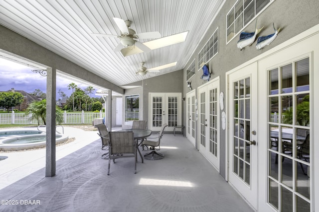 7 Foxfords Chase, Ormond Beach, FL 32174 - view of patio / terrace with french doors, a ceiling fan, an in-ground hot tub, and outdoor dining area