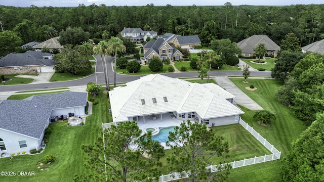 7 Foxfords Chase, Ormond Beach, FL 32174 - aerial perspective of suburban area with a pool area and a heavily wooded area