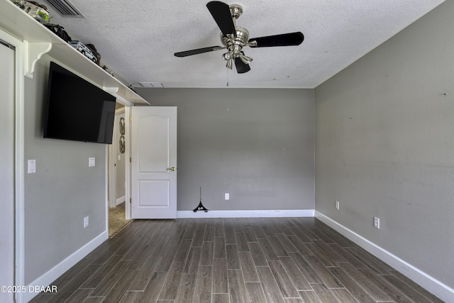 7 Foxfords Chase, Ormond Beach, FL 32174 - unfurnished room featuring a textured ceiling, ceiling fan, and wood finished floors