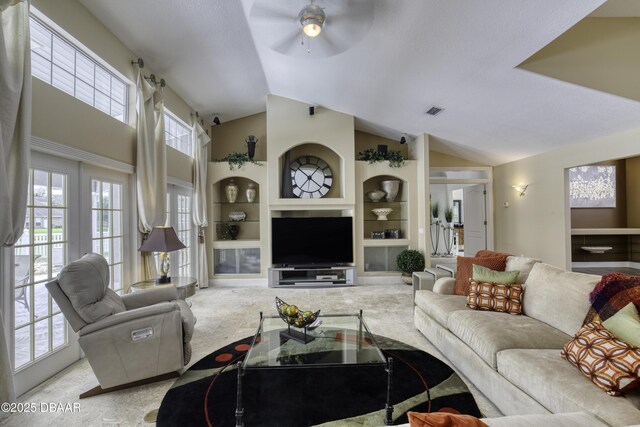 7 Foxfords Chase, Ormond Beach, FL 32174 - living area with built in features, a ceiling fan, and lofted ceiling
