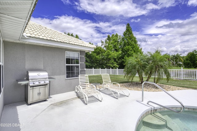 7 Foxfords Chase, Ormond Beach, FL 32174 - fenced backyard featuring area for grilling, a patio area, and a pool