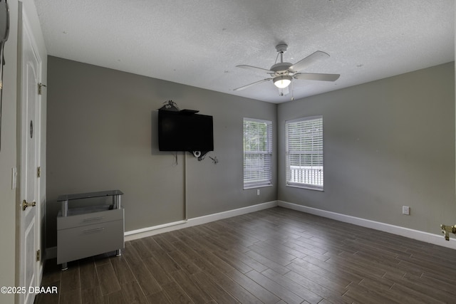 7 Foxfords Chase, Ormond Beach, FL 32174 - spare room with ceiling fan, dark wood finished floors, and a textured ceiling