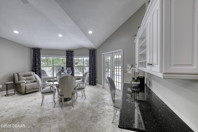 7 Foxfords Chase, Ormond Beach, FL 32174 - dining room with recessed lighting, healthy amount of natural light, a textured ceiling, vaulted ceiling, and french doors