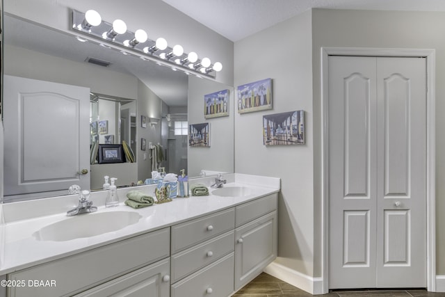 7 Foxfords Chase, Ormond Beach, FL 32174 - bathroom with double vanity, a shower, and a closet