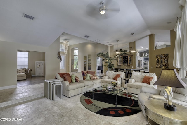 7 Foxfords Chase, Ormond Beach, FL 32174 - living room featuring lofted ceiling and a ceiling fan