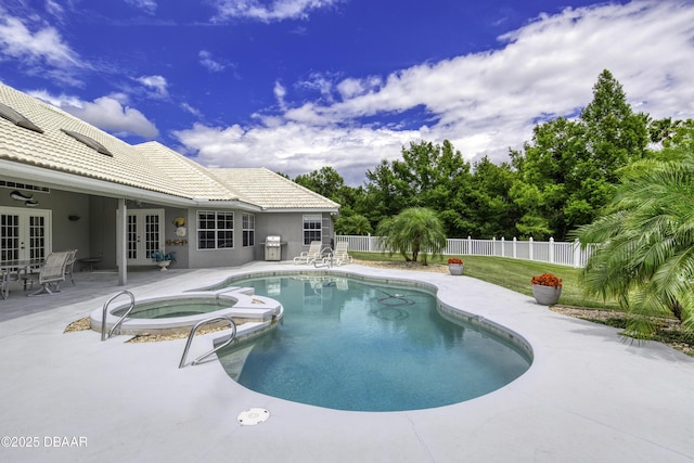 7 Foxfords Chase, Ormond Beach, FL 32174 - view of pool with french doors, a fenced backyard, a patio, and a pool with connected hot tub