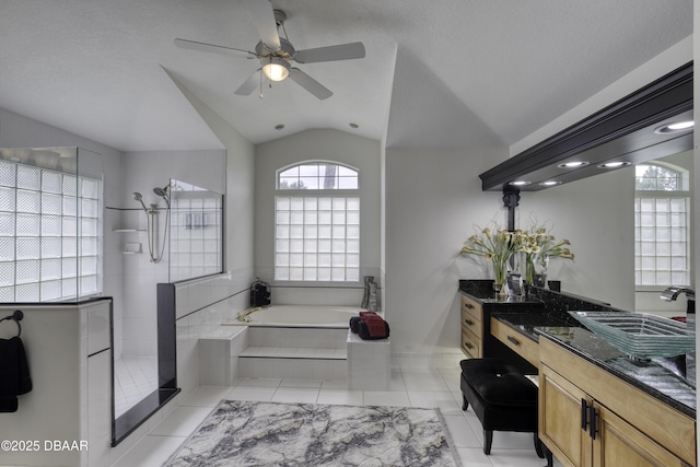 7 Foxfords Chase, Ormond Beach, FL 32174 - full bathroom featuring vaulted ceiling, tiled shower, a bath, a ceiling fan, and vanity
