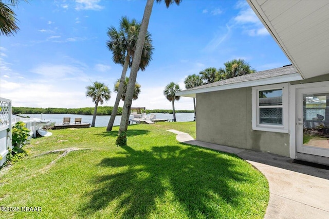 5967 Riverside Dr, Port Orange, FL 32127 - view of grassy yard with a water view
