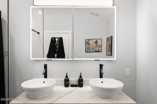5967 Riverside Dr, Port Orange, FL 32127 - bathroom with double vanity