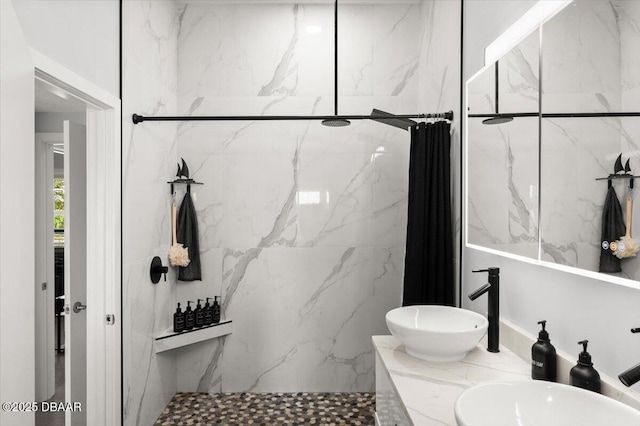 5967 Riverside Dr, Port Orange, FL 32127 - full bathroom featuring a marble finish shower and double vanity
