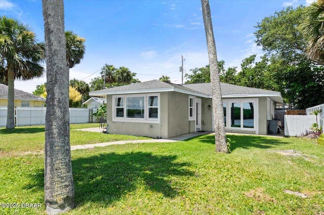 5967 Riverside Dr, Port Orange, FL 32127 - view of front of property with stucco siding and a shingled roof