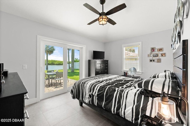 5967 Riverside Dr, Port Orange, FL 32127 - bedroom featuring access to outside and ceiling fan