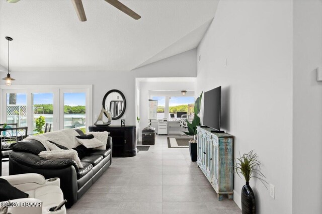 5967 Riverside Dr, Port Orange, FL 32127 - living area with ceiling fan and vaulted ceiling