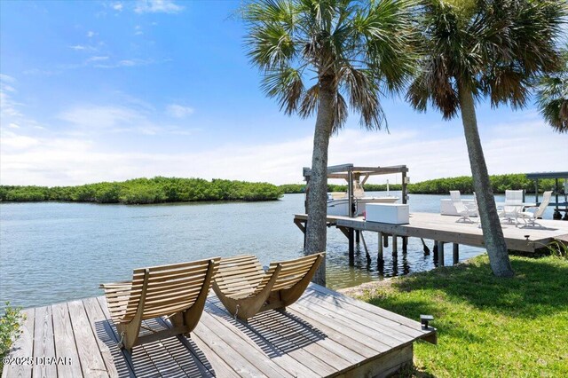 5967 Riverside Dr, Port Orange, FL 32127 - dock area featuring a water view and boat lift