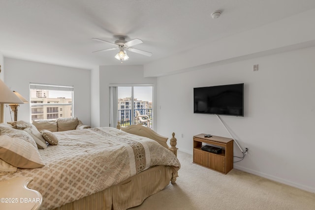 bedroom with carpet, baseboards, and ceiling fan