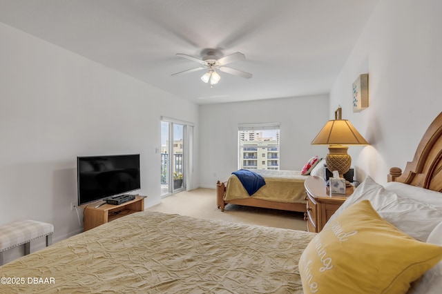 carpeted bedroom with access to exterior, baseboards, and a ceiling fan