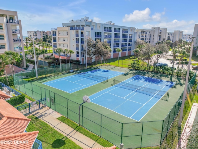 view of sport court with fence