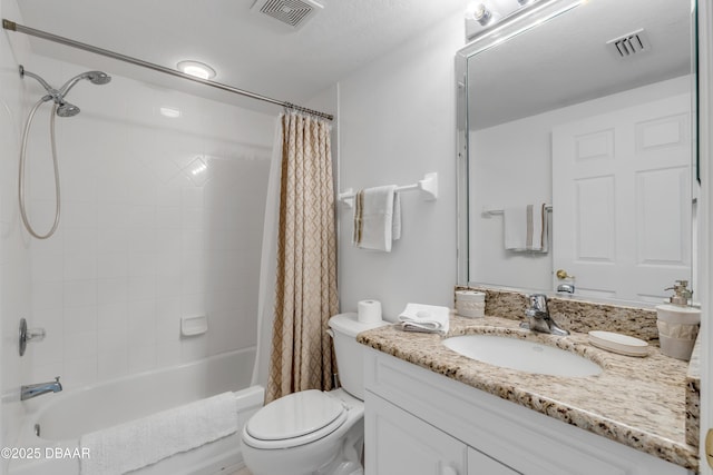 bathroom with shower / tub combo, visible vents, vanity, and toilet