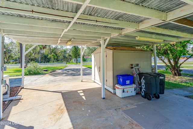 exterior space featuring a carport and a storage shed