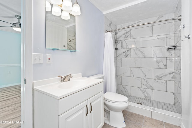 605 Orchard Ave, Ormond Beach, FL 32174 - bathroom with toilet, vanity, and a tile shower