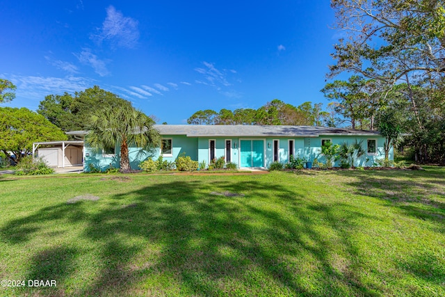 ranch-style house featuring a front yard