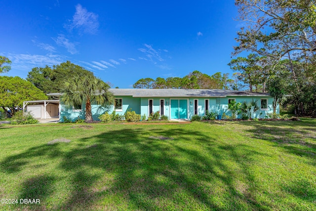 605 Orchard Ave, Ormond Beach, FL 32174 - ranch-style house featuring a front yard and stucco siding