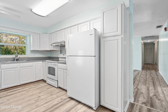 kitchen featuring white cabinetry, sink, white appliances, and light hardwood / wood-style flooring