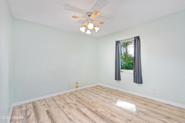 spare room with light wood-type flooring