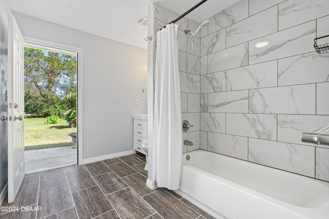 bathroom with vanity and shower / bathtub combination with curtain