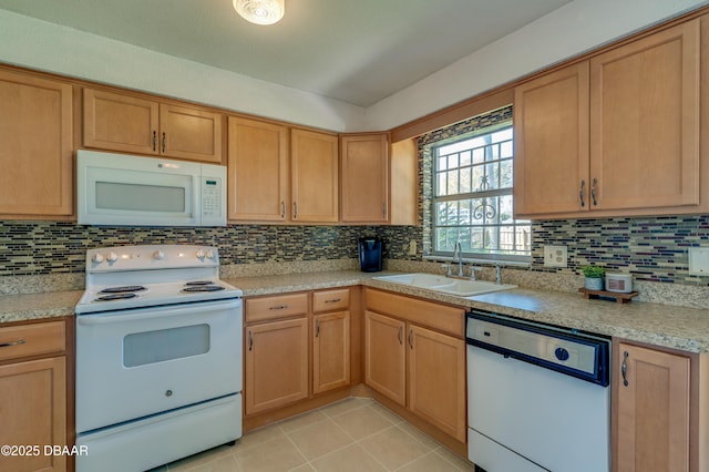 kitchen featuring sink, white appliances, decorative backsplash, and light tile patterned flooring