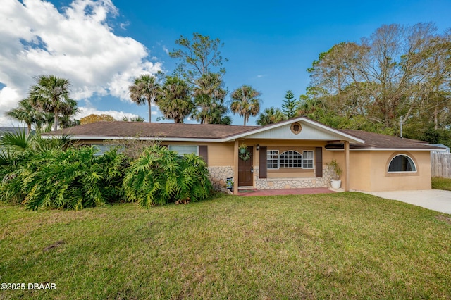 ranch-style house with a front lawn