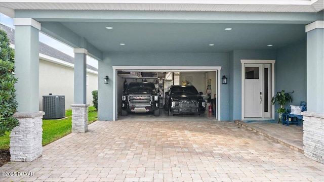 garage featuring central AC unit